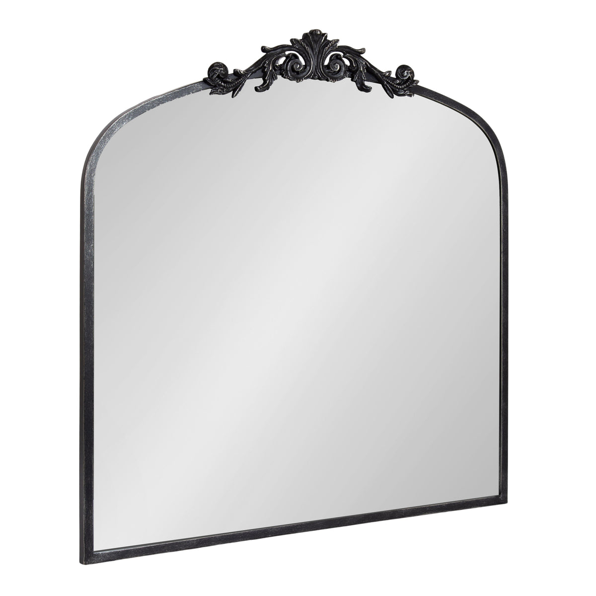 Decorative mirror with ornate black frame on a white background