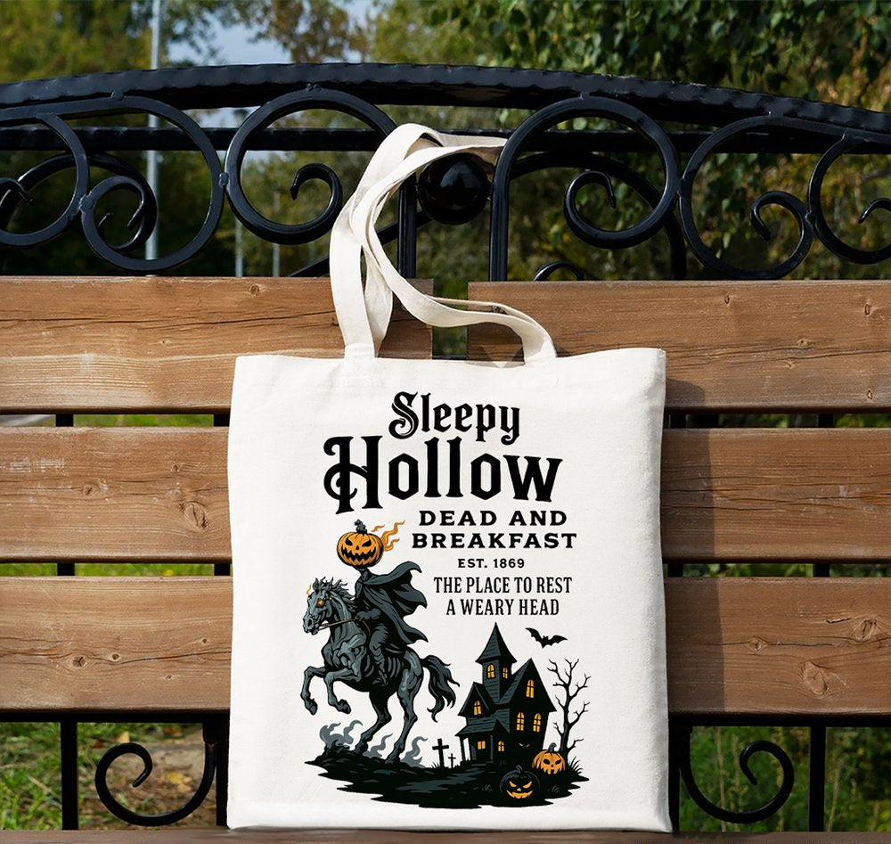 Tote bag with 'Sleepy Hollow' design featuring a witch on a horse and a haunted house.