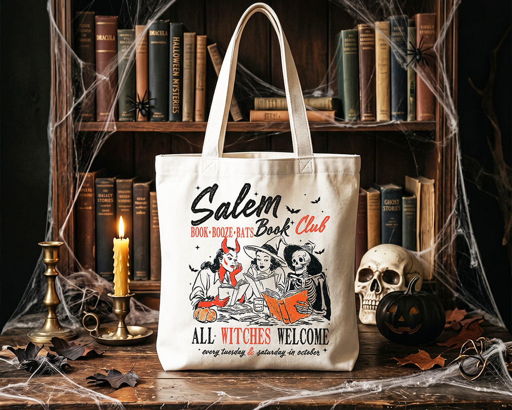 Tote bag with 'Salem Book Club' design on a Halloween-themed background with books and candles.