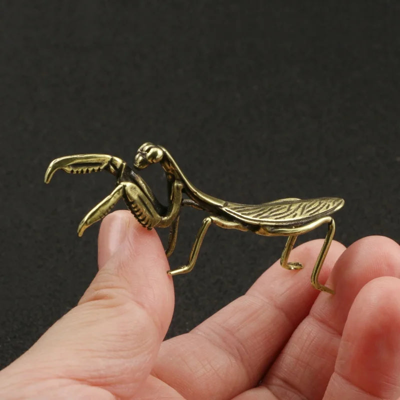 The Brass Mantis Curio