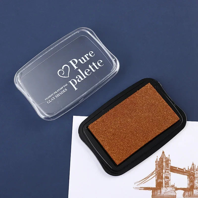 Brown clay shade with 'Pure Palette' container on a blue background