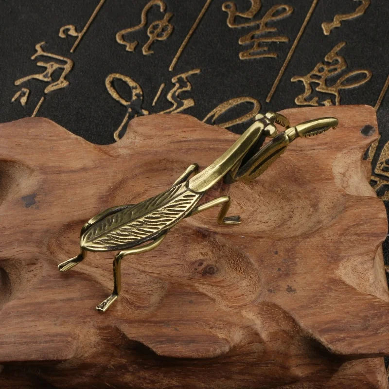 The Brass Mantis Curio