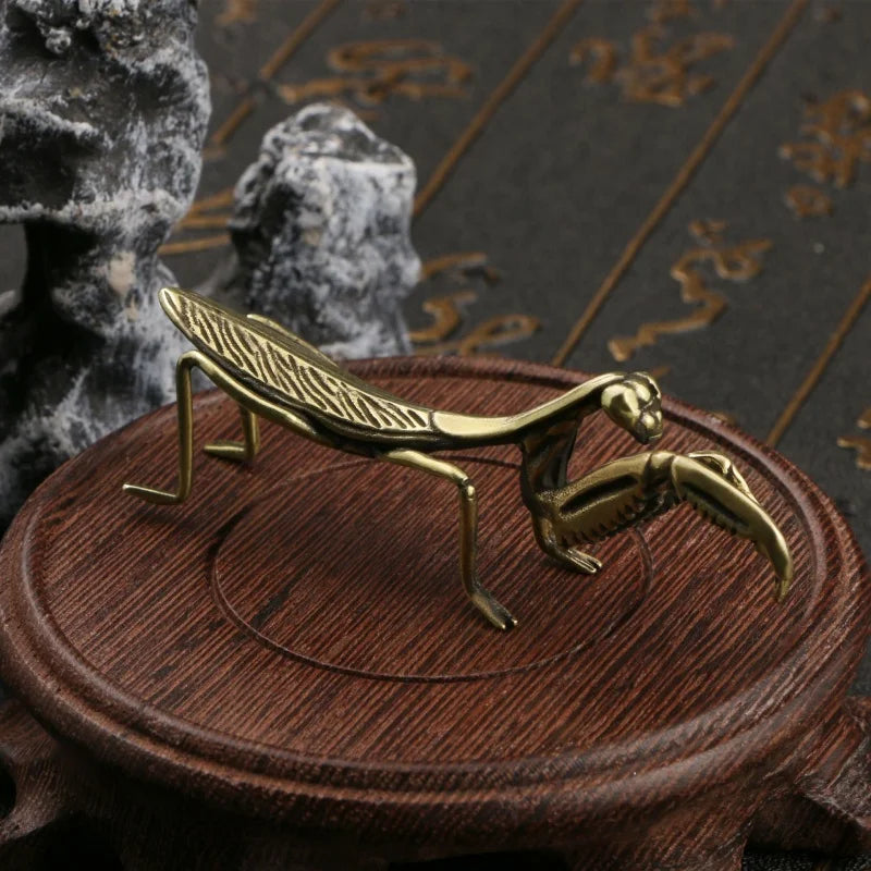 The Brass Mantis Curio