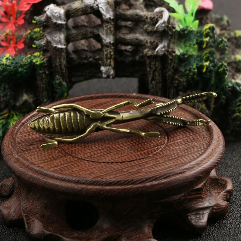 The Brass Mantis Curio