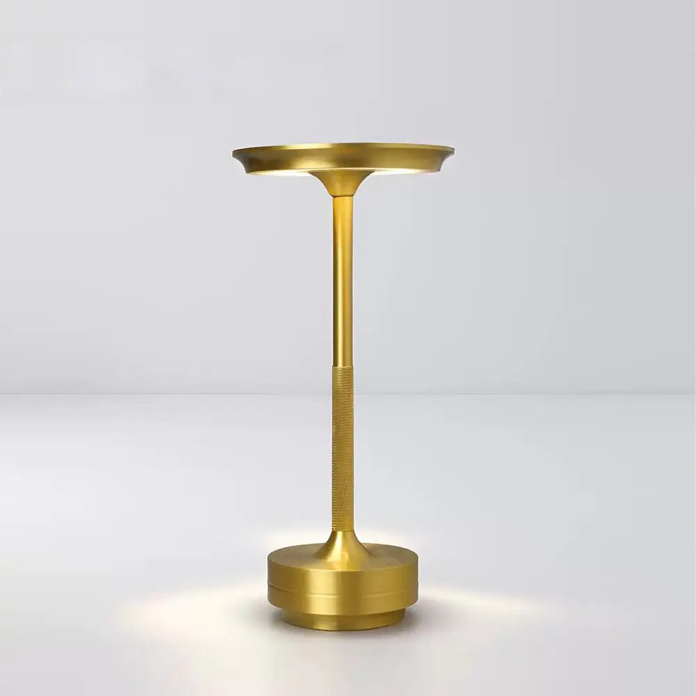 Gold-colored lamp on a white background