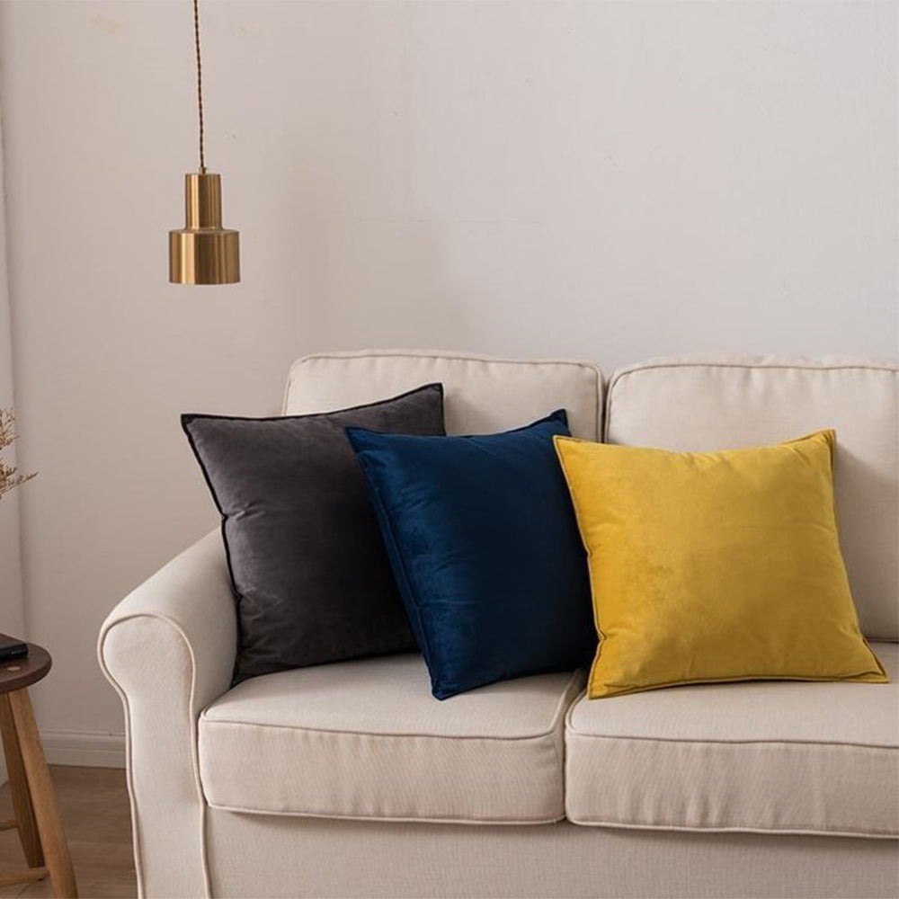 Beige sofa with colorful cushions in a living room setting