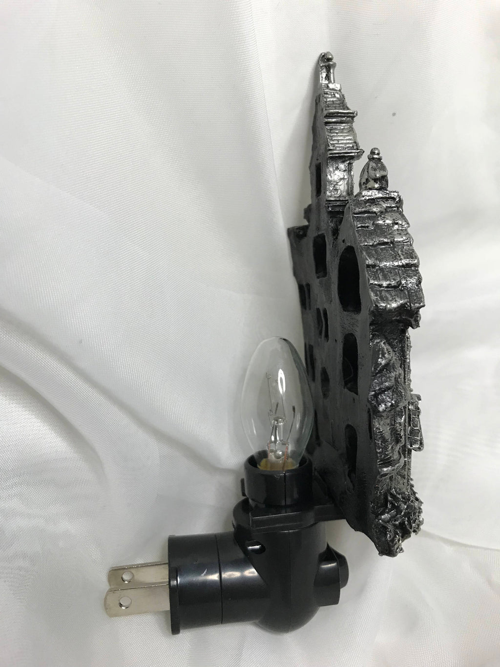 Light fixture with gear design on a white background
