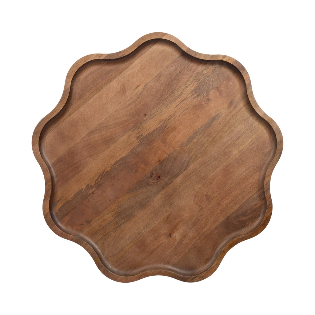 Wooden tray with scalloped edge on a white background